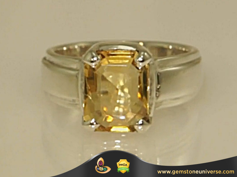 Golden Yellow Topaz Solitaire Ring set in White Gold Byond