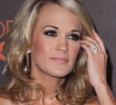 American Idol Winner Carrie Underwood wears a Fancy Yellow Diamond ring