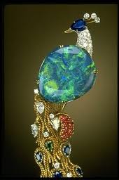Ornate Jewelry Masterpiece with the Opal as the Center Gem